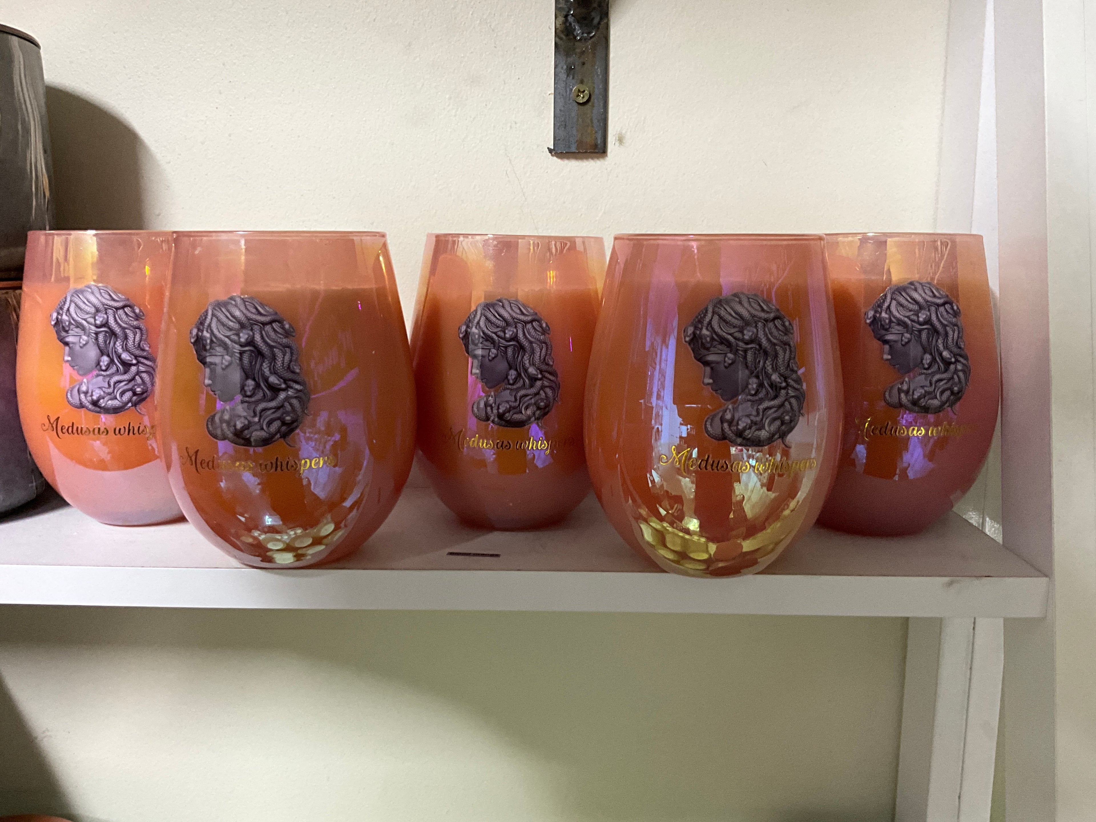 Blood orange soy candle in orange pink vessel