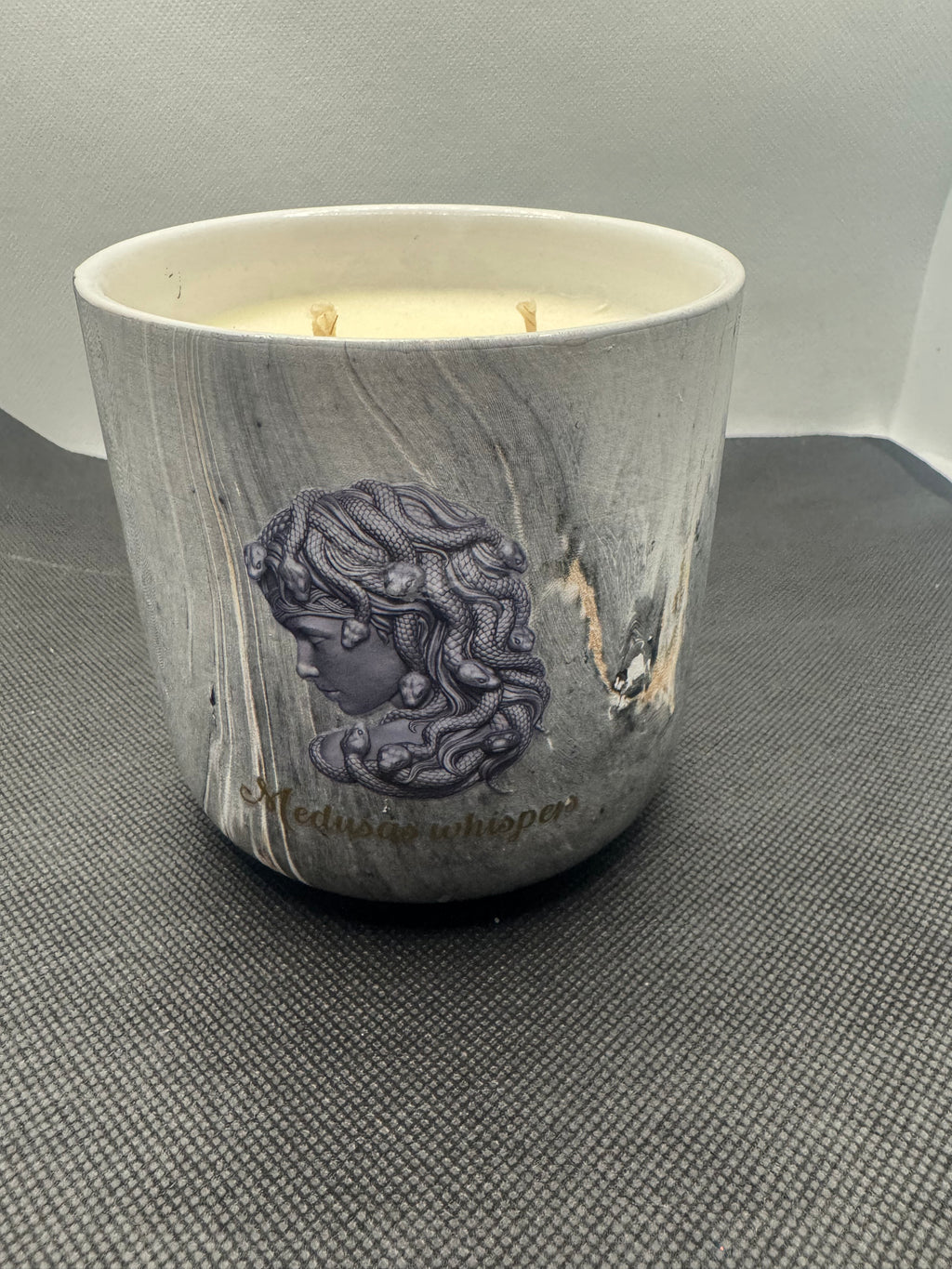 Large 500 gram candles in marble look jar.